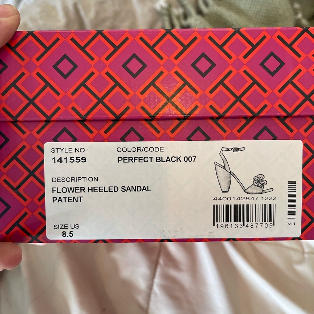 Brand new, in box. Tory Burch flower heeled sandal.